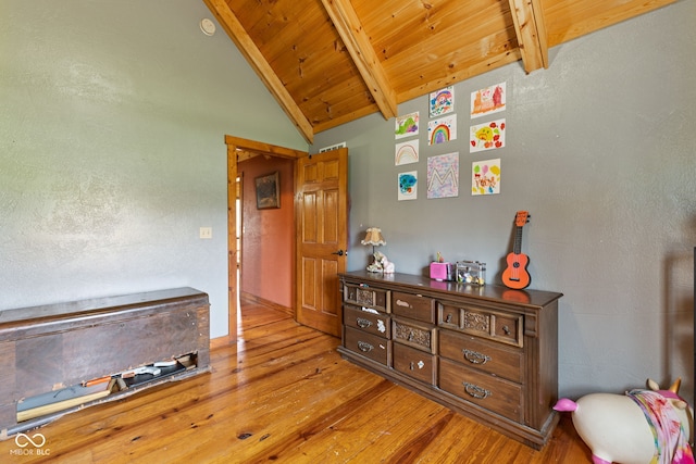 6351 Dixon Rd, Columbus, IN 47201 - bedroom featuring hardwood / wood-style flooring, vaulted ceiling with beams, and wood ceiling
