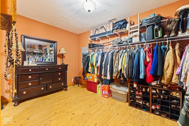 6351 Dixon Rd, Columbus, IN 47201 - walk in closet featuring wood finished floors