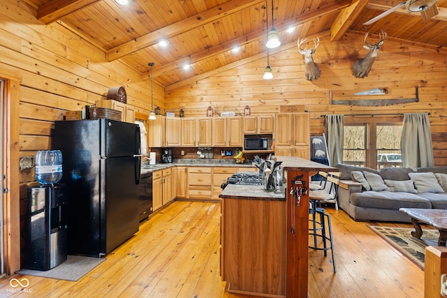 6351 Dixon Rd, Columbus, IN 47201 - kitchen featuring light wood-type flooring, wooden walls, beam ceiling, and black appliances