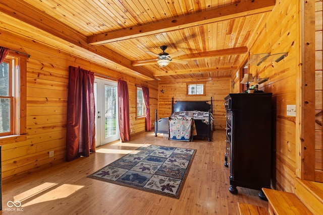 6351 Dixon Rd, Columbus, IN 47201 - bedroom with wooden walls, light wood-style flooring, access to exterior, beamed ceiling, and wood ceiling