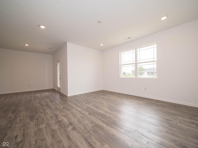 915 Saddlebrook Farms Blvd, Whiteland, IN 46184 - spare room featuring dark wood-style floors and recessed lighting