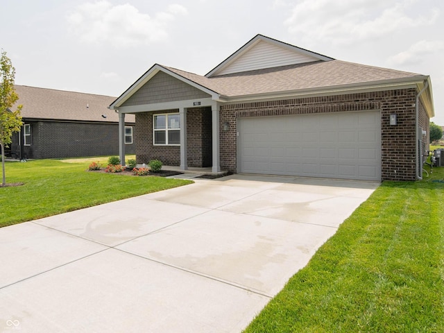 915 Saddlebrook Farms Blvd, Whiteland, IN 46184 - view of front facade with brick siding, a garage, a front lawn, and concrete driveway