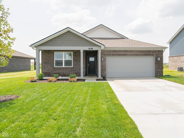 915 Saddlebrook Farms Blvd, Whiteland, IN 46184 - view of front of home featuring brick siding, a garage, a front lawn, and concrete driveway