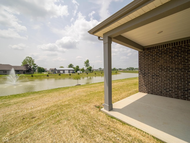 915 Saddlebrook Farms Blvd, Whiteland, IN 46184 - view of grassy yard featuring a water view and a patio