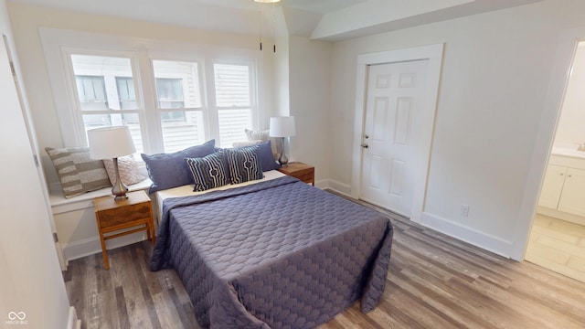 926 N Dearborn St, Indianapolis, IN 46201 - bedroom featuring wood finished floors and baseboards