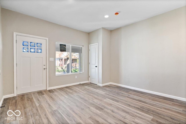 243 N Tacoma Ave, Indianapolis, IN 46201 - entrance foyer featuring wood finished floors, baseboards, and recessed lighting