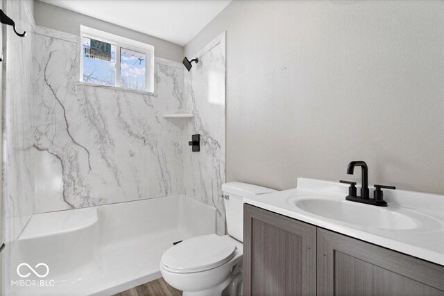 243 N Tacoma Ave, Indianapolis, IN 46201 - bathroom with a shower, toilet, and vanity