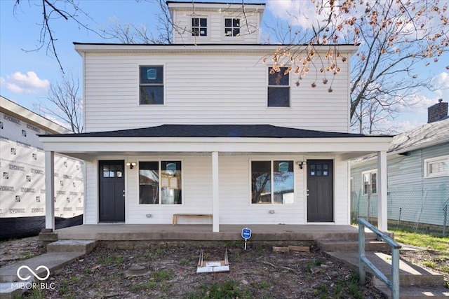 243 N Tacoma Ave, Indianapolis, IN 46201 - american foursquare style home featuring a porch