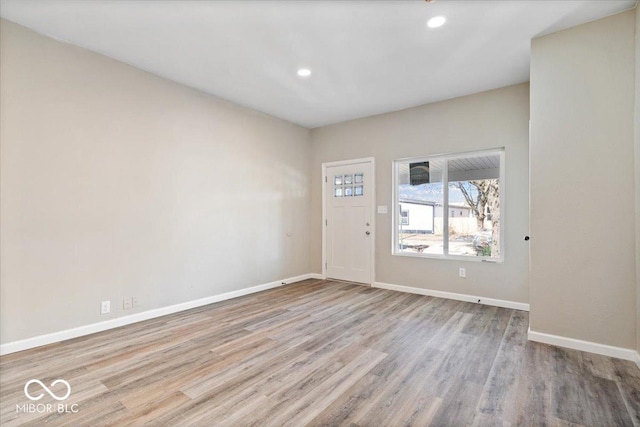 243 N Tacoma Ave, Indianapolis, IN 46201 - empty room with wood finished floors, baseboards, and recessed lighting