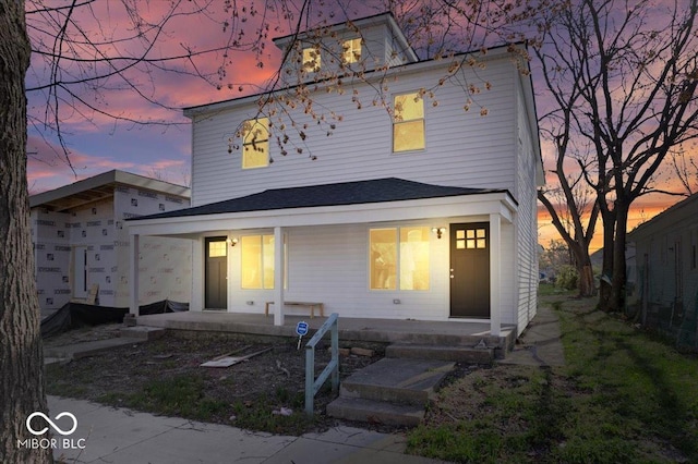 243 N Tacoma Ave, Indianapolis, IN 46201 - rear view of house with a porch