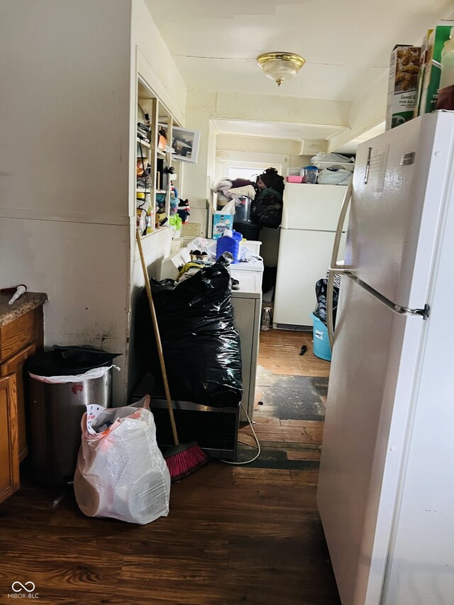918 N Olney St, Indianapolis, IN 46201 - kitchen featuring dark wood-type flooring and freestanding refrigerator