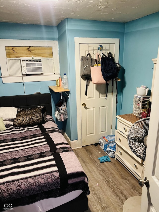 918 N Olney St, Indianapolis, IN 46201 - bedroom featuring cooling unit and wood finished floors