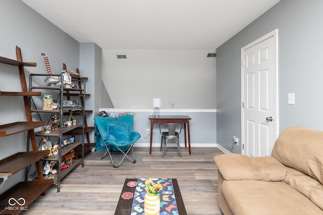 329 Dogwood Dr, Pendleton, IN 46064 - sitting room with wood finished floors and baseboards