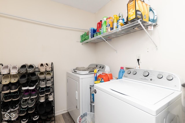 329 Dogwood Dr, Pendleton, IN 46064 - clothes washing area with washing machine and clothes dryer and wood finished floors