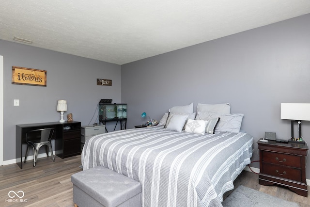 329 Dogwood Dr, Pendleton, IN 46064 - bedroom with wood finished floors and baseboards