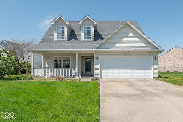 329 Dogwood Dr, Pendleton, IN 46064 - view of front of home featuring a porch, a shingled roof, a garage, and driveway