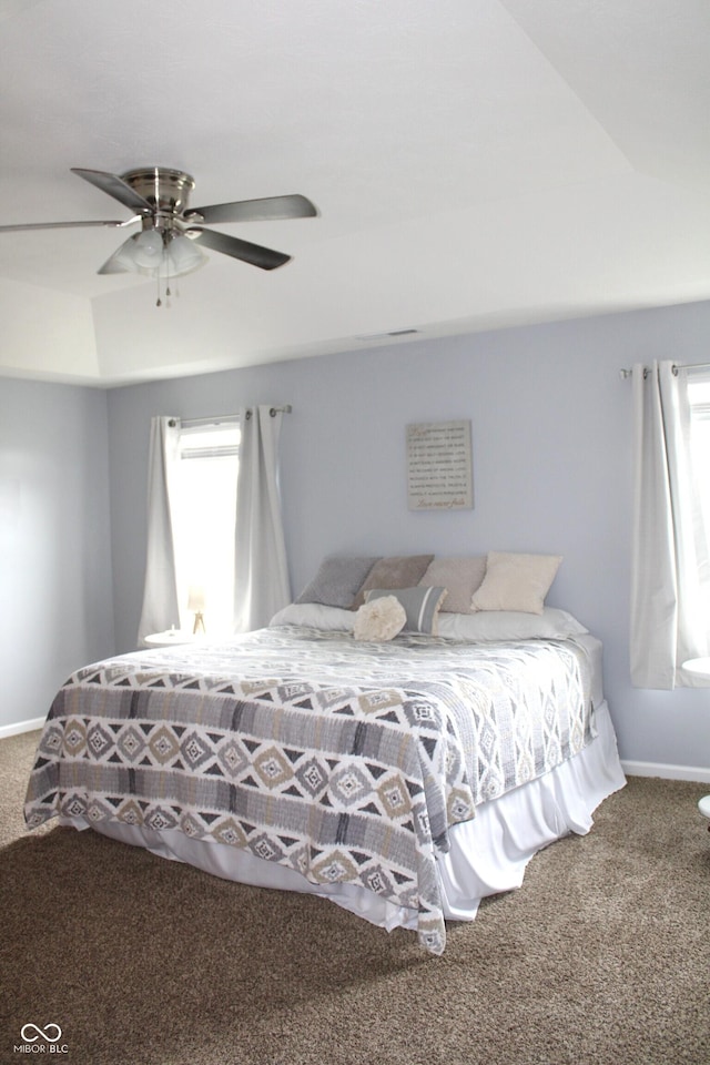 981 Redwood Dr, Franklin, IN 46131 - bedroom with carpet flooring, multiple windows, and a ceiling fan