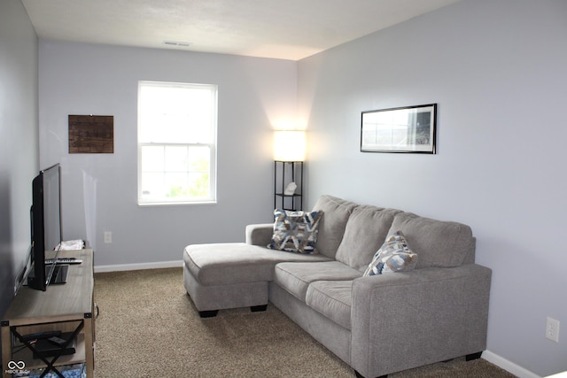 981 Redwood Dr, Franklin, IN 46131 - carpeted living area featuring baseboards