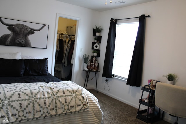 981 Redwood Dr, Franklin, IN 46131 - bedroom with carpet flooring, multiple windows, a closet, and a walk in closet