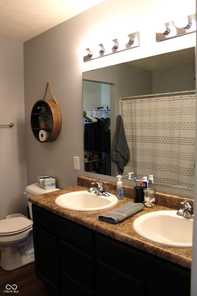 981 Redwood Dr, Franklin, IN 46131 - full bath featuring double vanity and wood finished floors