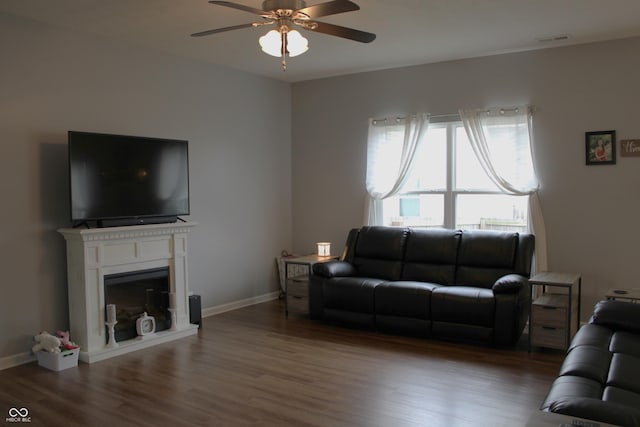 981 Redwood Dr, Franklin, IN 46131 - living room with a ceiling fan, wood finished floors, and a fireplace