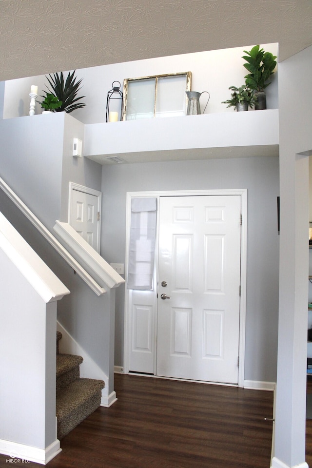 981 Redwood Dr, Franklin, IN 46131 - foyer entrance with wood finished floors and stairs