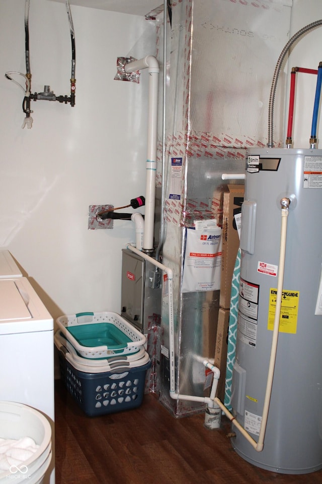 981 Redwood Dr, Franklin, IN 46131 - utility room featuring electric water heater and washer / dryer