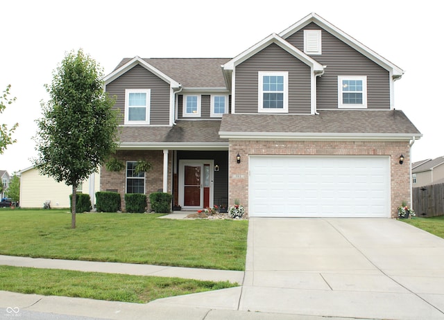 981 Redwood Dr, Franklin, IN 46131 - view of front of property featuring driveway, a garage, brick siding, and a shingled roof