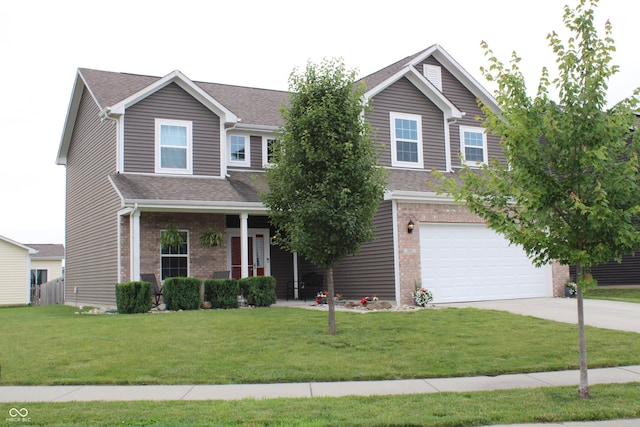 981 Redwood Dr, Franklin, IN 46131 - view of front of home featuring brick siding, driveway, a garage, and a front lawn