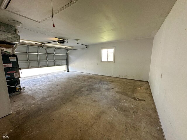 garage with heating unit and a garage door opener