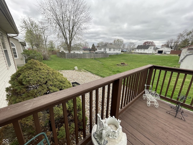 1310 Pin Oak Dr, Seymour, IN 47274 - deck featuring fence, a yard, and a residential view