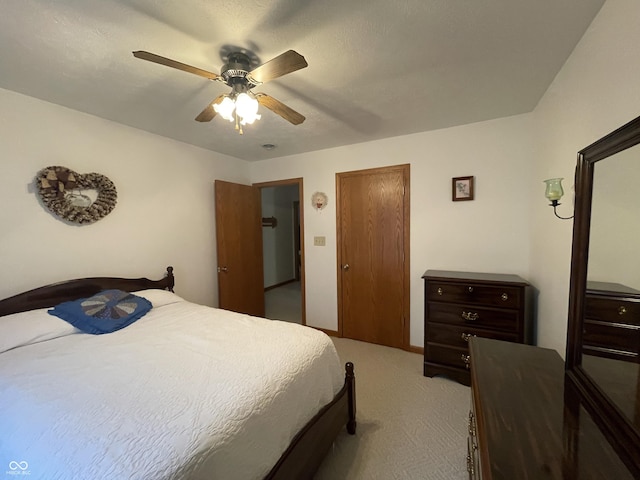 1310 Pin Oak Dr, Seymour, IN 47274 - bedroom with carpet flooring and a ceiling fan