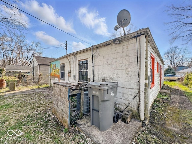 exterior space featuring concrete block siding