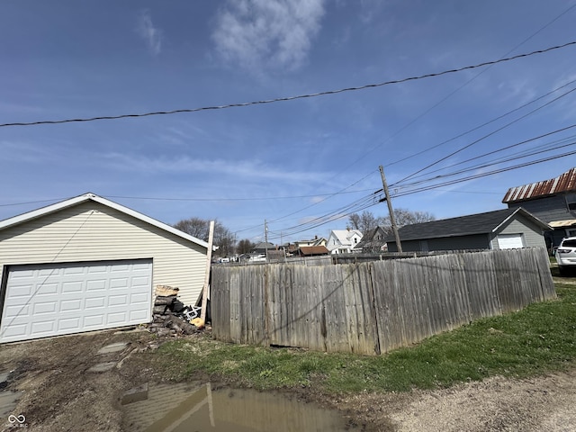 detached garage with fence