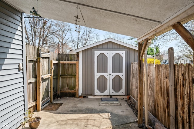 view of shed featuring a fenced backyard