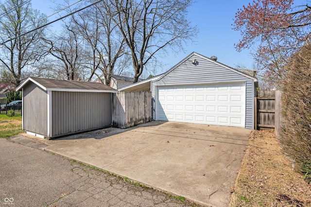 detached garage with fence