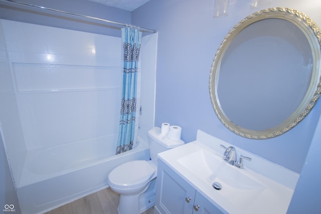 bathroom featuring shower / bathtub combination with curtain, wood finished floors, toilet, and vanity