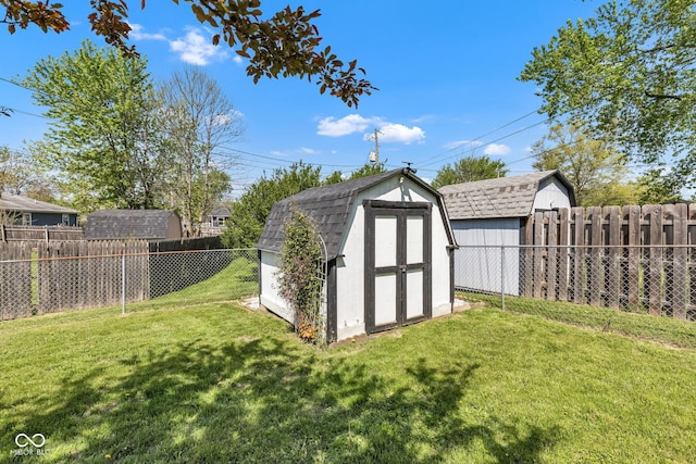 view of shed with a fenced backyard