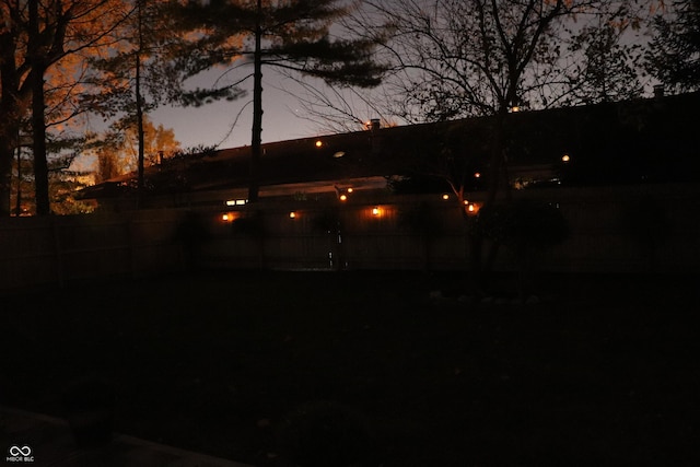 445 W 86th St, Indianapolis, IN 46260 - view of yard at dusk
