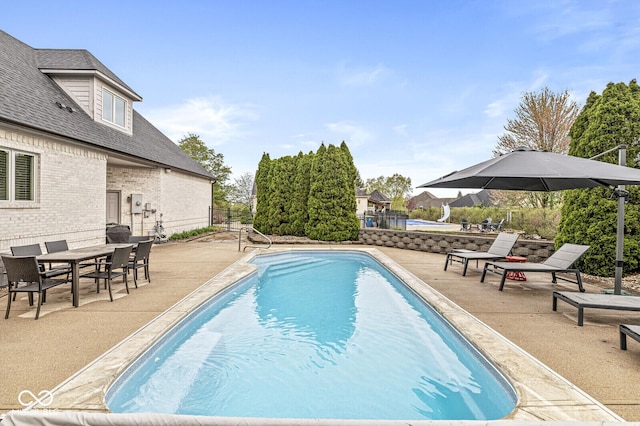 view of pool featuring fence, a patio, and a fenced in pool