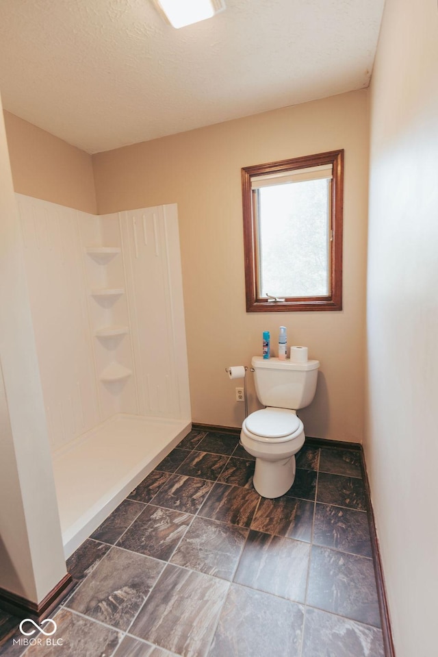 6712 Forrest Commons Blvd, Indianapolis, IN 46227 - full bath with baseboards, walk in shower, and toilet