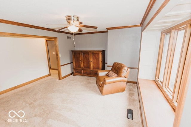 6712 Forrest Commons Blvd, Indianapolis, IN 46227 - living area with baseboards, visible vents, ornamental molding, and a ceiling fan