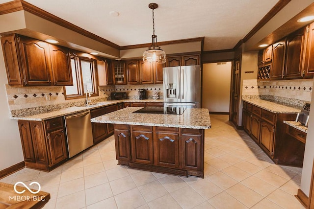 6712 Forrest Commons Blvd, Indianapolis, IN 46227 - kitchen with tasteful backsplash, crown molding, a sink, stainless steel appliances, and a center island