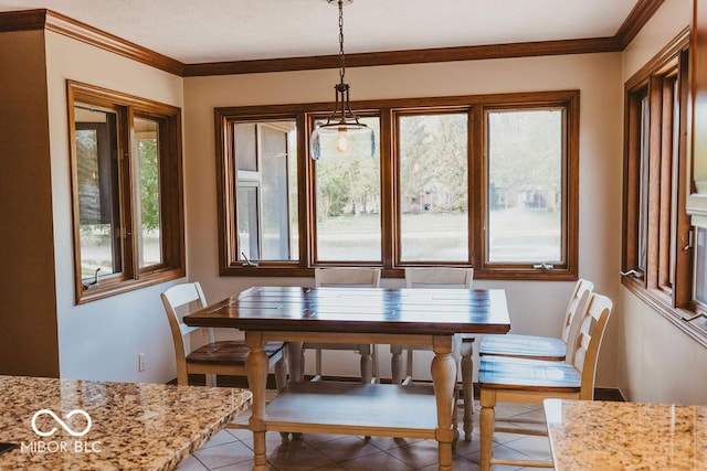 6712 Forrest Commons Blvd, Indianapolis, IN 46227 - dining area with light tile patterned flooring and ornamental molding