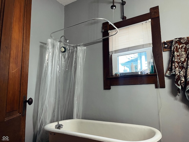 310 E Central Ave, Greensburg, IN 47240 - full bathroom with a freestanding bath and a shower with curtain