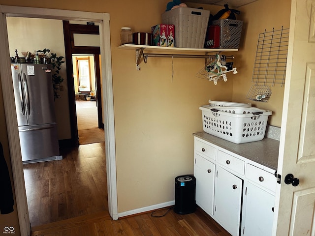 310 E Central Ave, Greensburg, IN 47240 - corridor featuring dark wood-style floors and baseboards