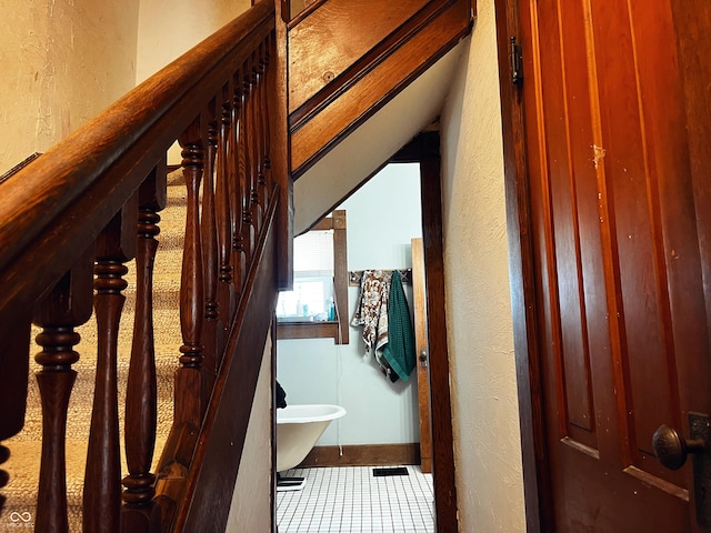 310 E Central Ave, Greensburg, IN 47240 - bathroom with a textured wall, tile patterned flooring, and baseboards