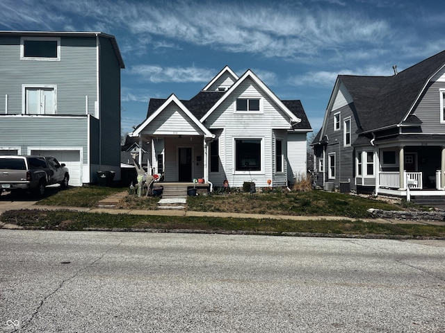 310 E Central Ave, Greensburg, IN 47240 - view of front facade featuring a porch and an attached garage