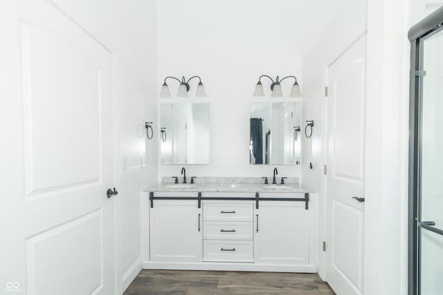 8267 W County Road 350 S, Shirley, IN 47384 - full bathroom featuring double vanity, wood finished floors, and a sink