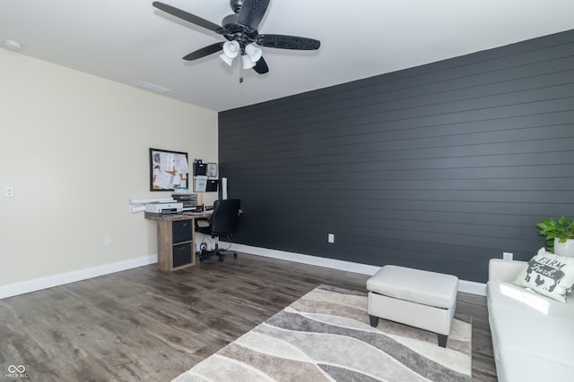 8267 W County Road 350 S, Shirley, IN 47384 - office space with dark wood-style flooring, baseboards, an accent wall, visible vents, and a ceiling fan